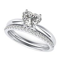 Delicate And Classic Solitaire Engagement Ring With Matching Band