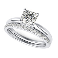 Delicate And Classic Solitaire Engagement Ring With Matching Band